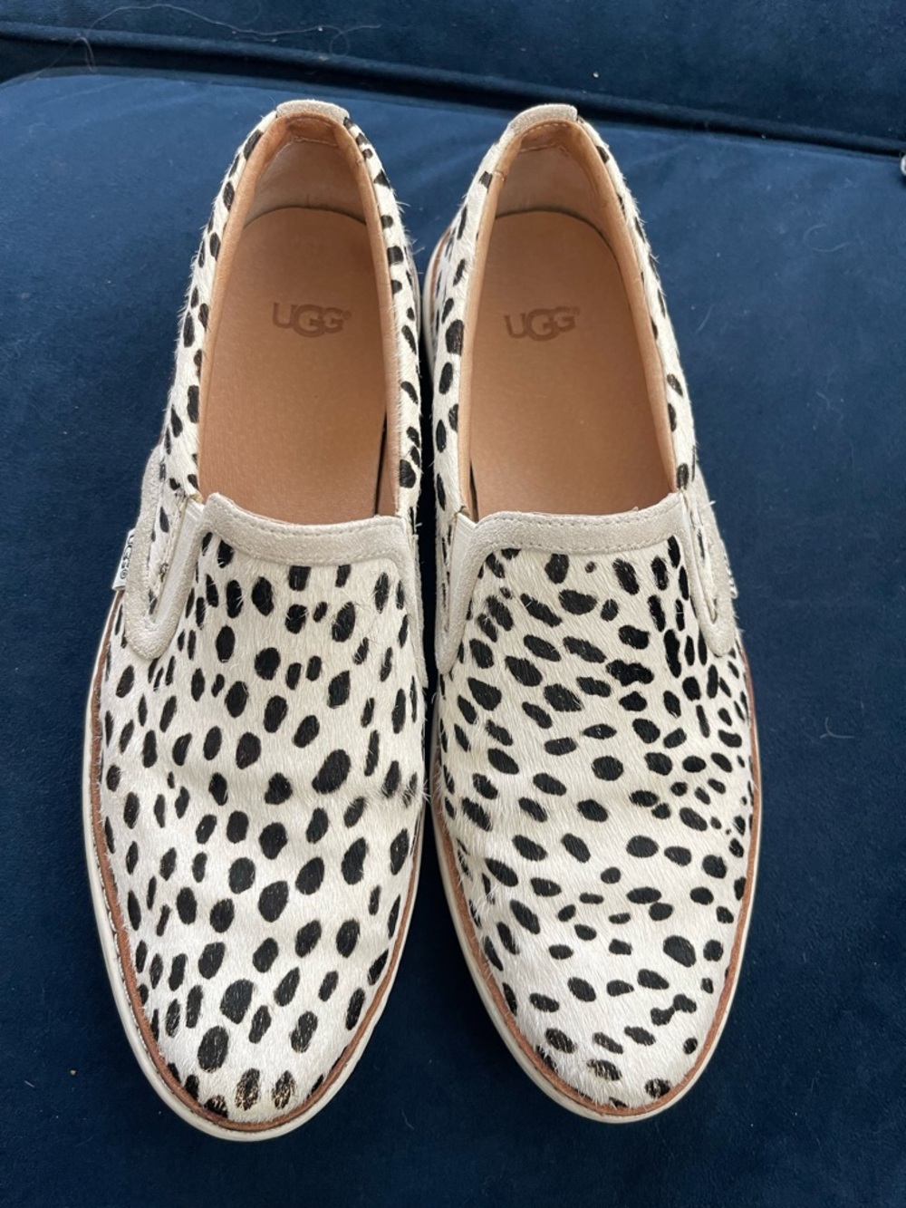 UGG black and white calfskin slip ons. Sz. 9